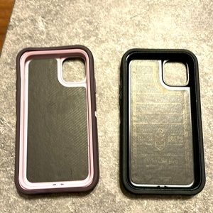 Two used Otter Box Defender Pros. Fit IPhone 11. In good condition.